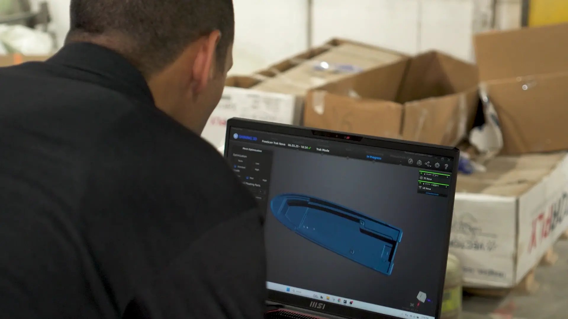 SHINING 3D technician is checking the boat data